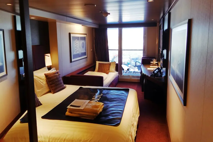 Каюта с балконом с раздвижным односпальным диваном для 3-го туриста